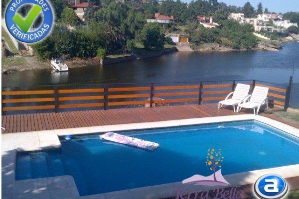 CASA PARA 8/10  SOBRE EL LAGO SAN ROQUE. HERMOSA VISTA. PILETA (COMPARTIDA)