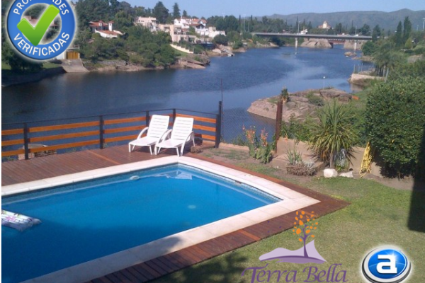 CASA PARA 8/10  SOBRE EL LAGO SAN ROQUE. HERMOSA VISTA. PILETA (COMPARTIDA)