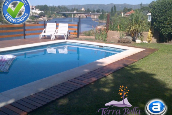 CASA PARA 8/10  SOBRE EL LAGO SAN ROQUE. HERMOSA VISTA. PILETA (COMPARTIDA)