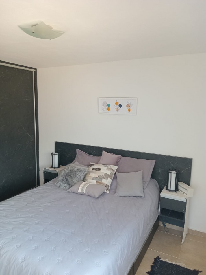 DUPLEX 2 DORMITORIOS CON COCHERA Y PATIO PROPIO EN BARRIO LAS ENSENADAS